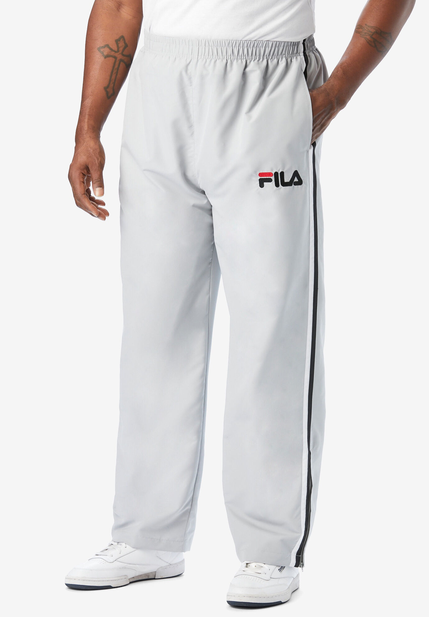 Buy FILA's Tearaway Popper Track Pants in Black | Hypebae